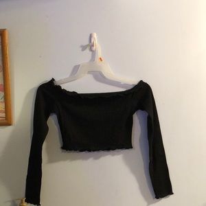 Long sleeve crop top and black plaid skirt outfit